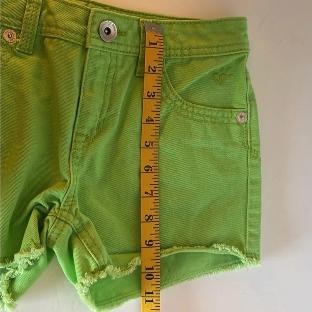 Justice lime green Jean shorts.  Simply low style  Girls size 14 S
